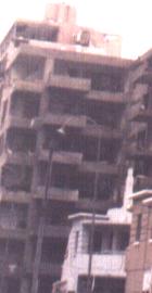 Ce qui reste du bâtiment proche de la voiture piègée après l'explosion